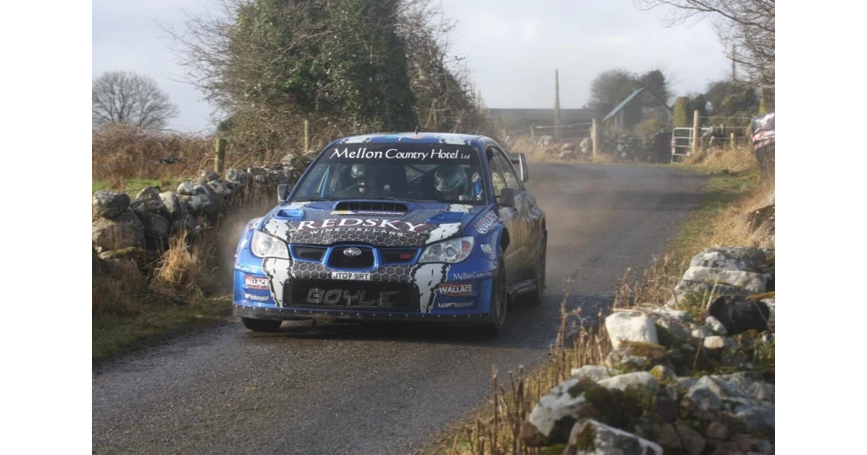 Declan and Brian Boyle lift the Colm Quinn BMW Galway International Rally